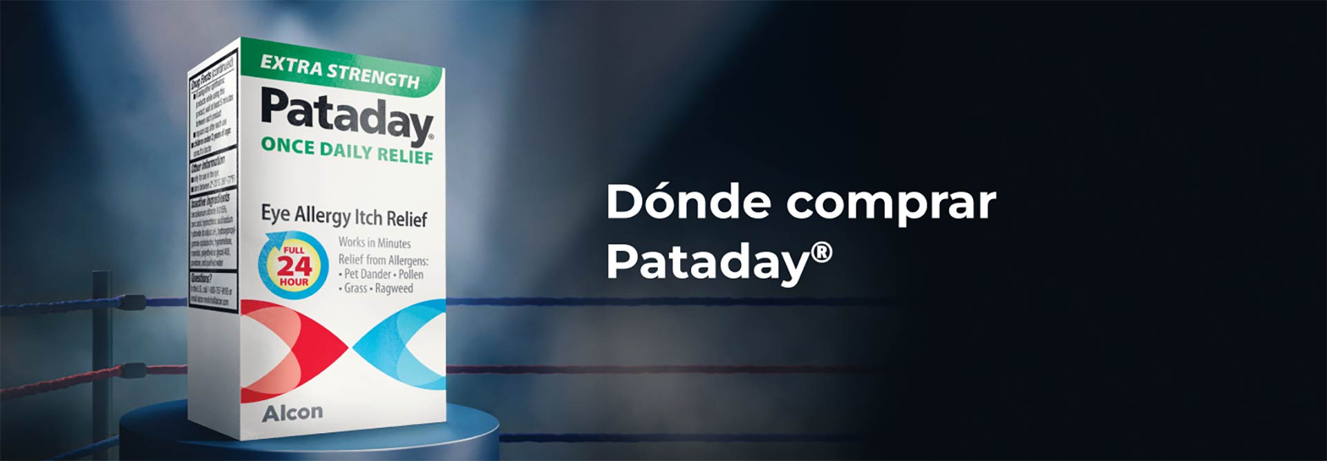 Una caja del producto Extra Strength Pataday descansando sobre un taburete en la esquina de un ring de boxeo, con cuerdas azules y rojas en el fondo.